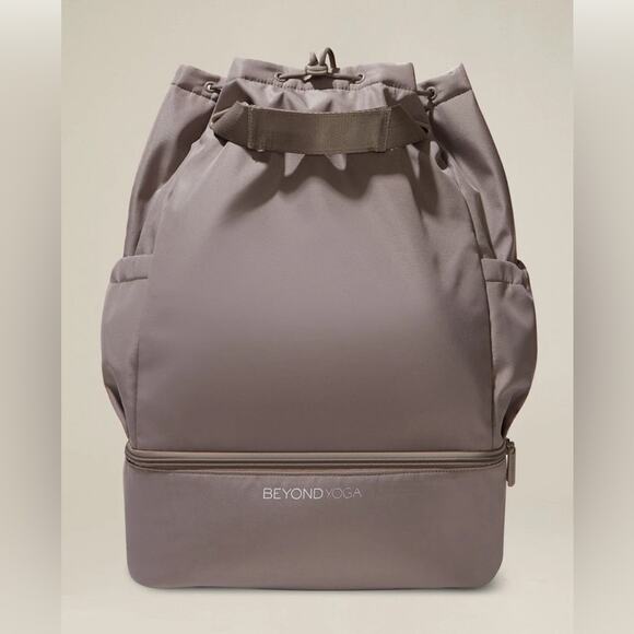 Beyond Yoga Other - Beyond Yoga Taupe Drawstring Top Backpack with Lower Zip Compartment